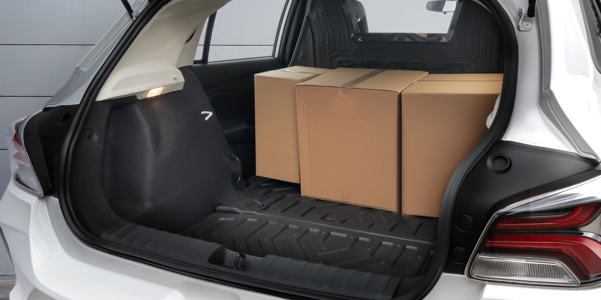 Conheça o Chevrolet Onix Log 2027, o carro com bagageiro grande